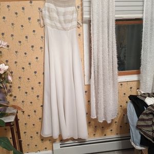 Long white gown with pearl embellishments stored in garment bag Vintage size 8